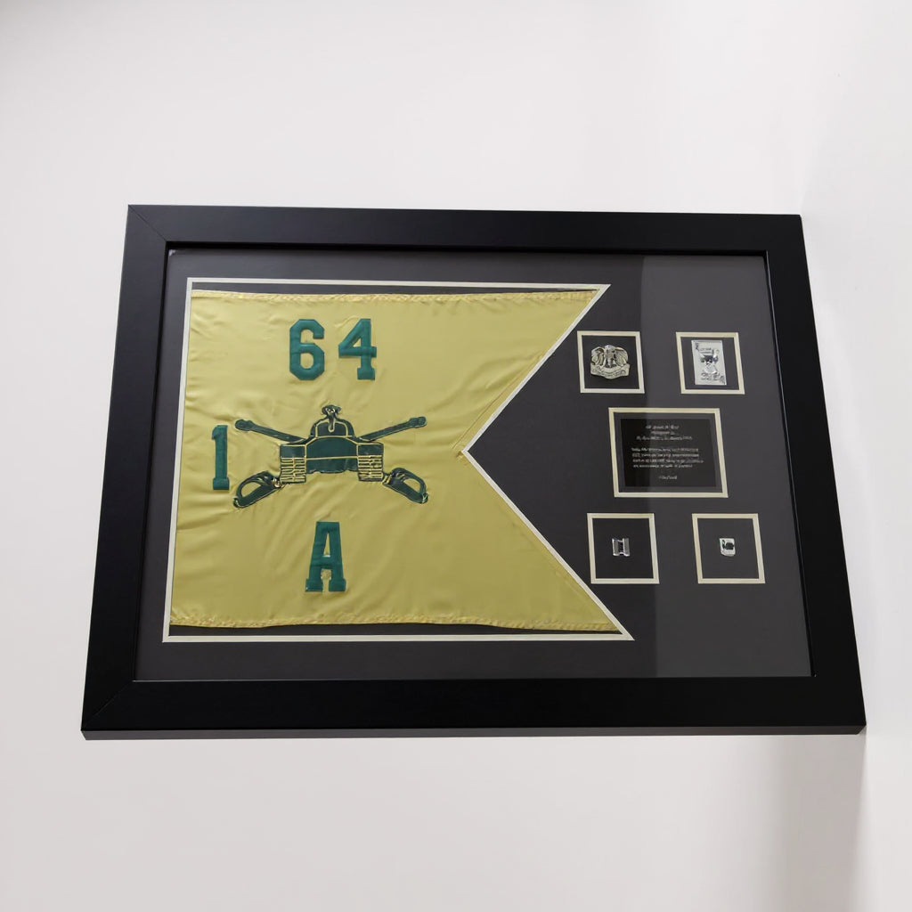 Framed vintage flag with numbers and a logo on a white background
