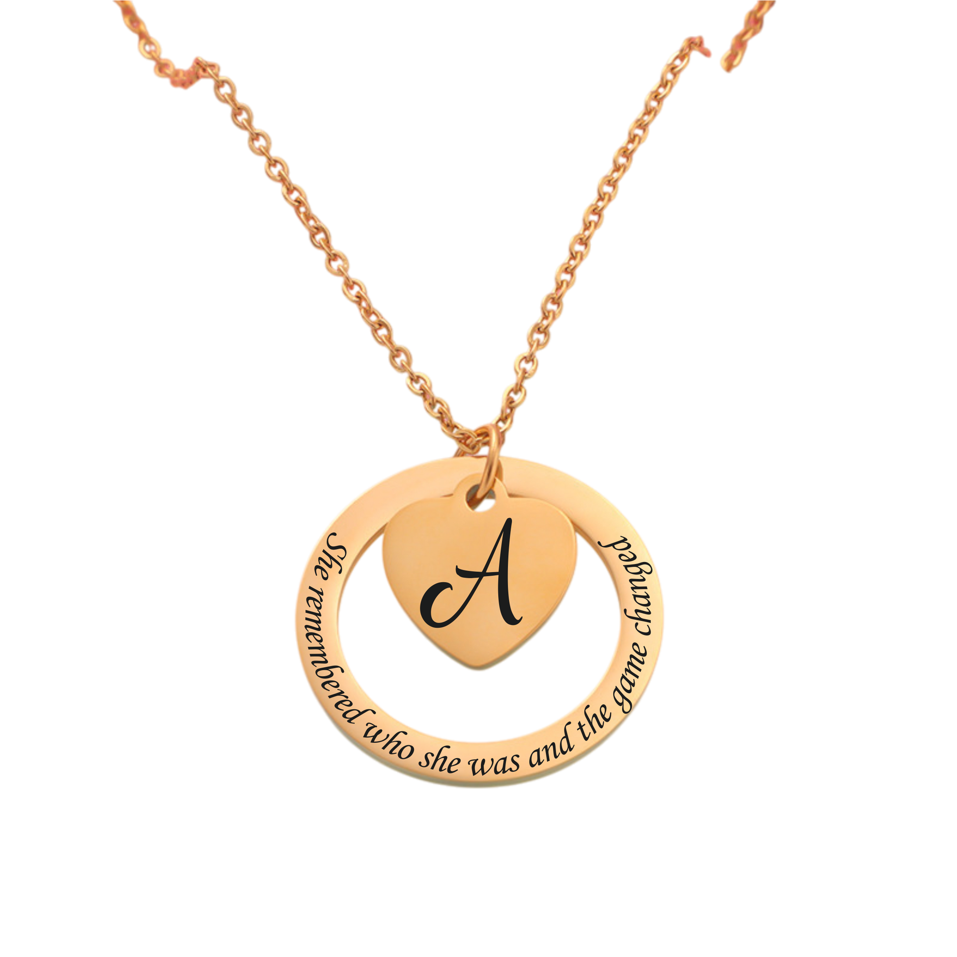 Gold necklace with a heart-shaped pendant featuring the letter 'A' and engraved text on a white background.